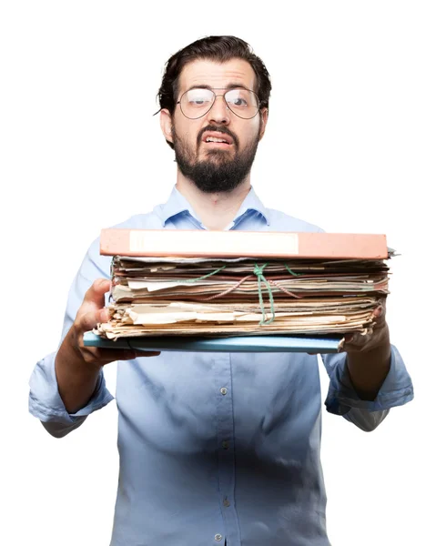 Stressed young man with files — Stock Photo, Image