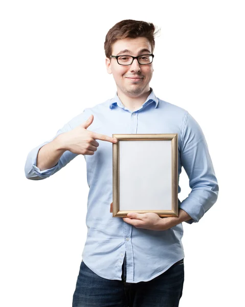 Šťastný mladý muž s retro rámeček — Stock fotografie