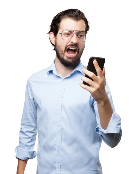 Jovem zangado com celular — Fotografia de Stock