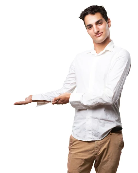 Счастливый молодой человек, показывающий жест — стоковое фото