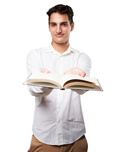 Happy young man with small book — Stock Photo, Image