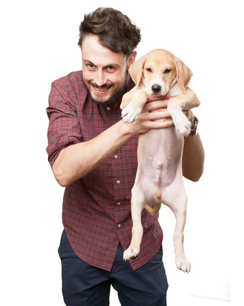 Anak muda yang bahagia dengan anak anjing — Stok Foto