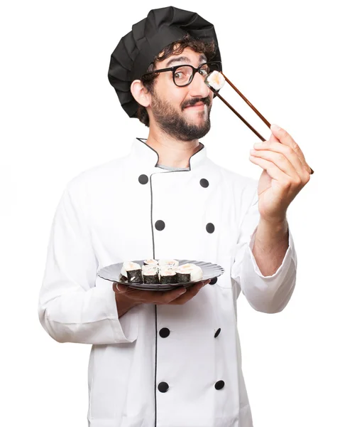 Happy cook man with sushi — Stock Photo, Image