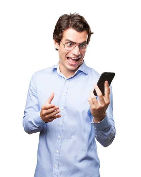 Happy young man with mobile phone — Stock Photo, Image