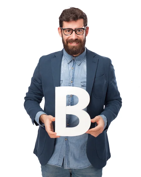 Homem de negócios feliz segurando letra B — Fotografia de Stock