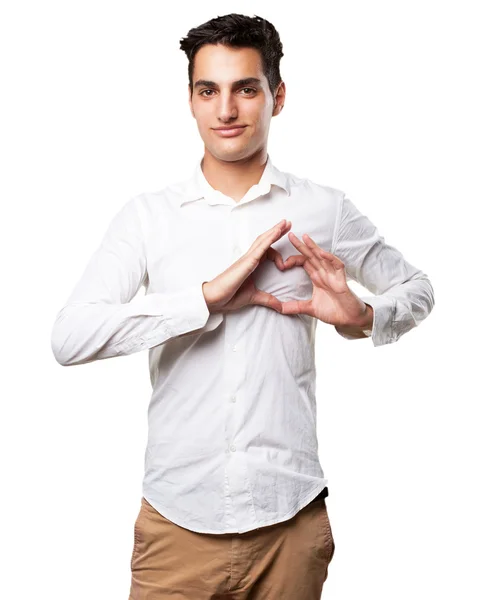 Gelukkig jonge man met een hartsymbool — Stockfoto