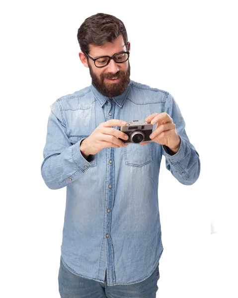 Gelukkig jonge man met camera — Stockfoto