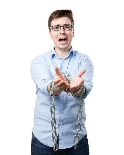 Jeune homme stressé avec chaîne — Photo