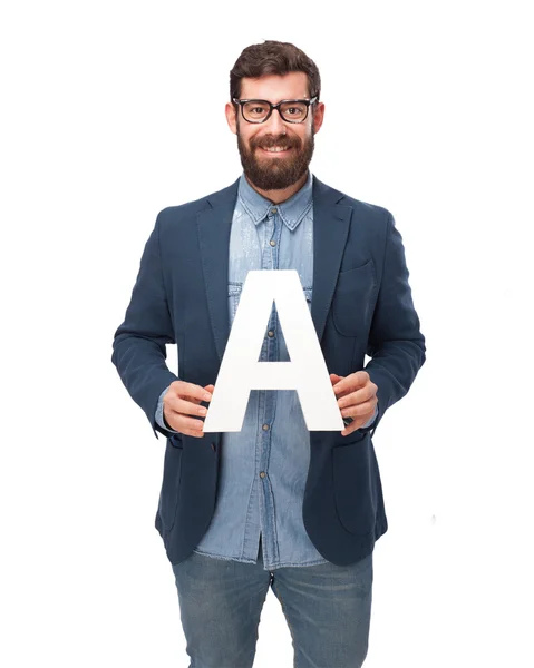 Hombre de negocios feliz celebración de la carta A — Foto de Stock