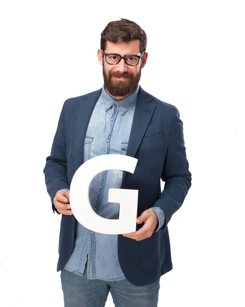 Happy businessman holding letter G — Stock Photo, Image