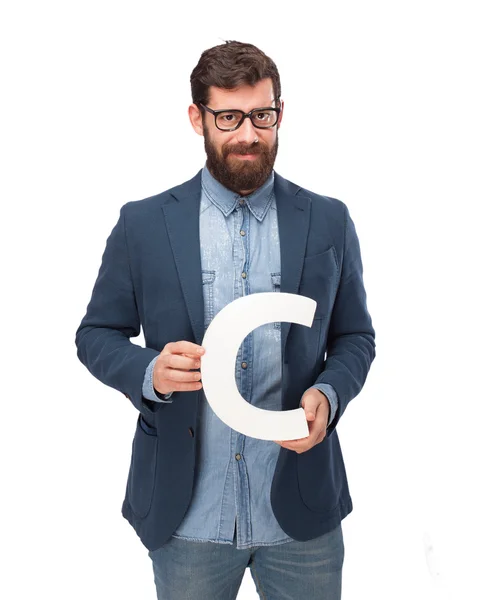 Happy businessman holding letter C — Stock Photo, Image