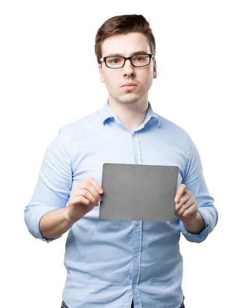 Young man with grey card — Stock Photo, Image
