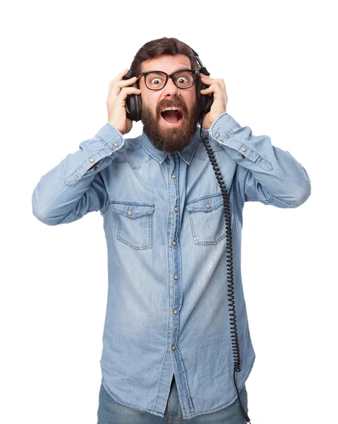 Bláznivý mladý muž se sluchátky — Stock fotografie
