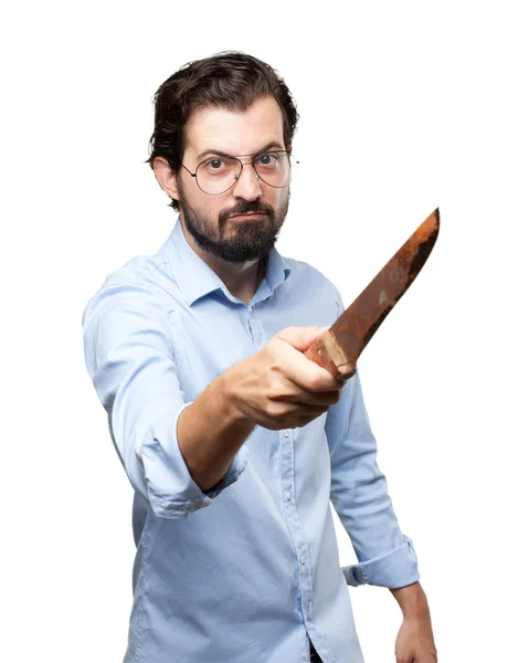 Angry young man with knife — Stock Photo, Image