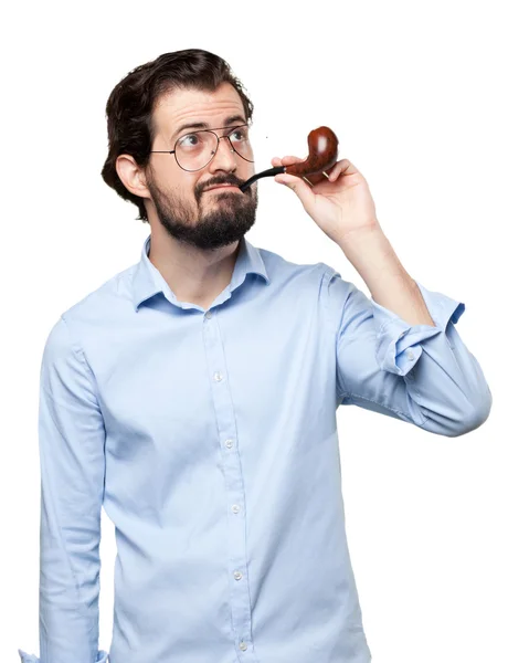 Proud young man with pipe — Stock Photo, Image