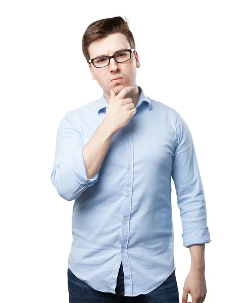 Confused young man thinking — Stock Photo, Image