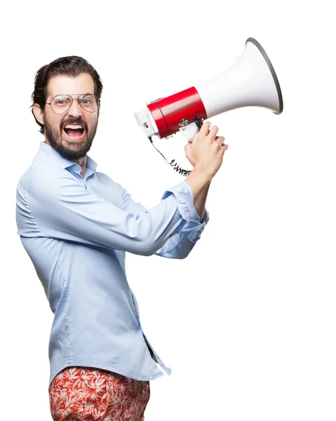 Joven enojado con megáfono — Foto de Stock