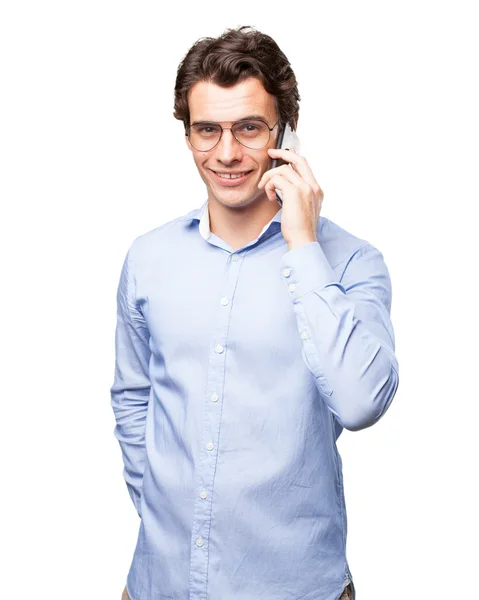 Happy young man with mobile phone — Stock Photo, Image