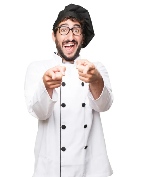Cozinheiro feliz homem apontando sinal frontal — Fotografia de Stock