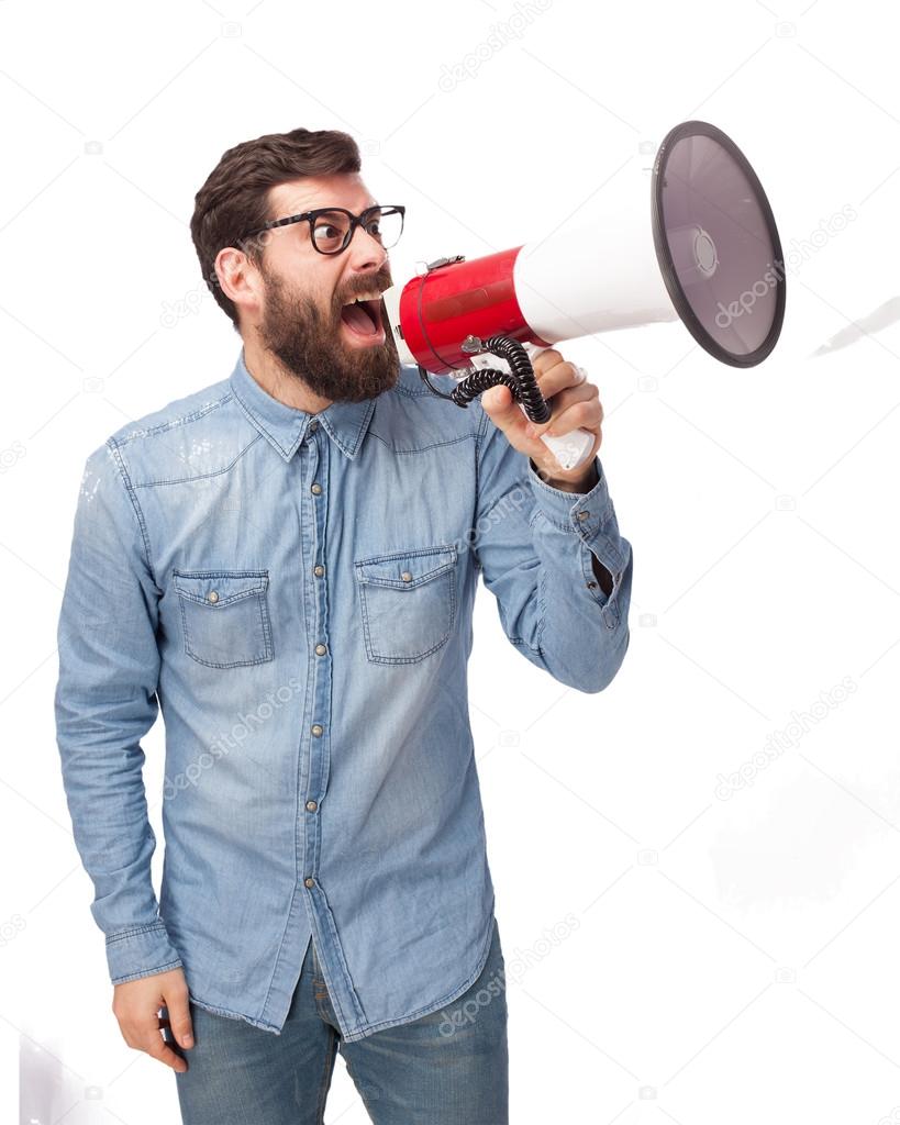 angry young man with megaphone