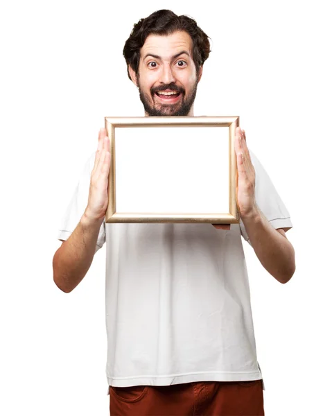 Gek jongeman met retro frame — Stockfoto