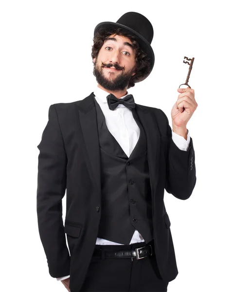 Homem fumando feliz com chave do vintage — Fotografia de Stock