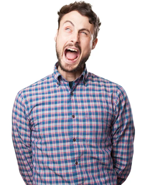 Surprised young man shouting — Stock Photo, Image