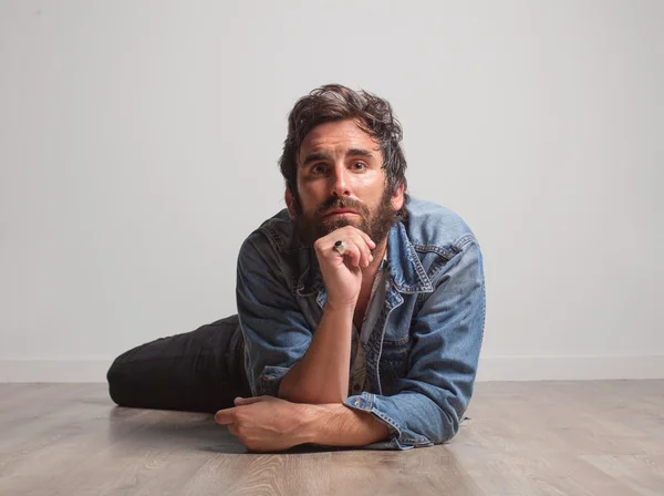 Rock musician posing in studio — Stock Photo, Image