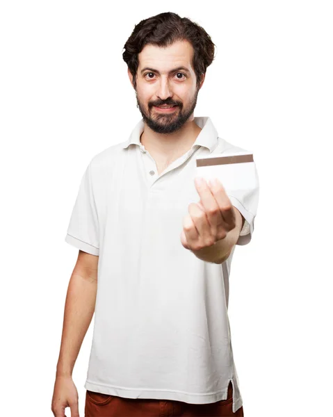 Happy young man with credit card — Stock Photo, Image