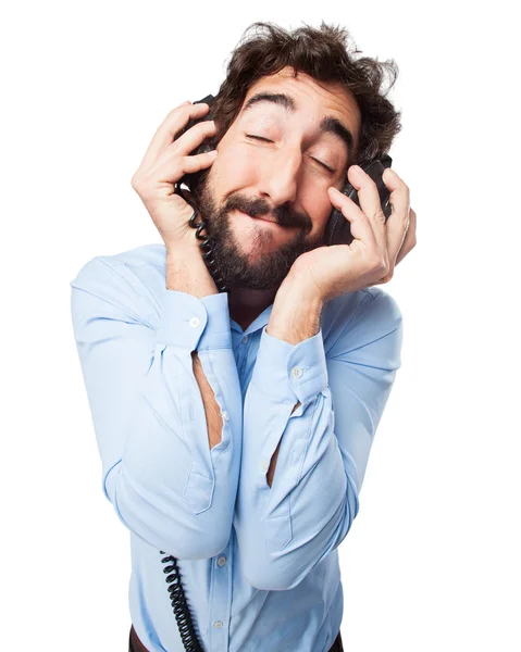 Joven feliz con auriculares — Foto de Stock