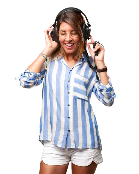 Mujer joven bailando con auriculares —  Fotos de Stock