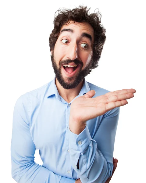 Překvapený mladý muž ukazuje gesto — Stock fotografie