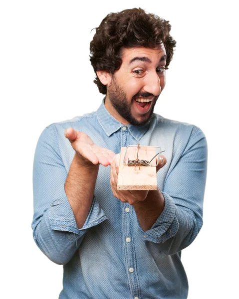 Happy young man with mousetrap — Stock Photo, Image