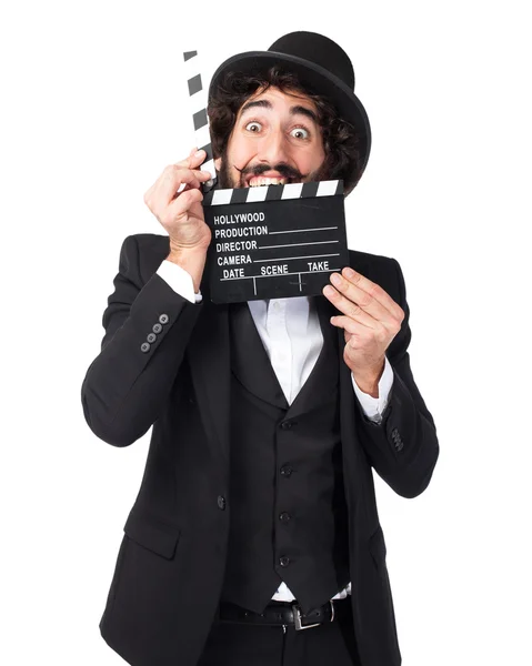 Happy smoking man with clapper — Stock Photo, Image