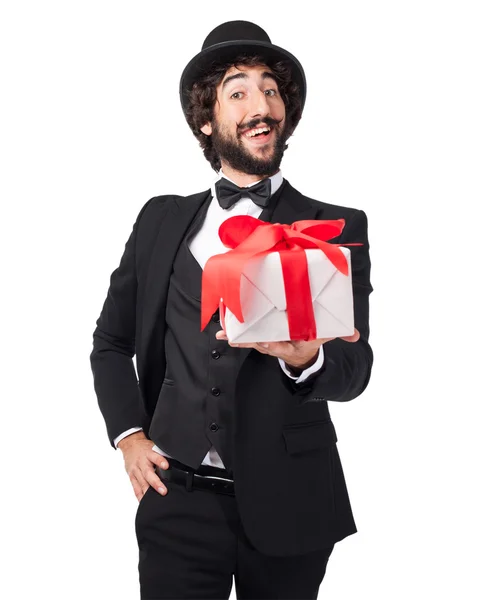 Happy smoking man with gift — Stock Photo, Image