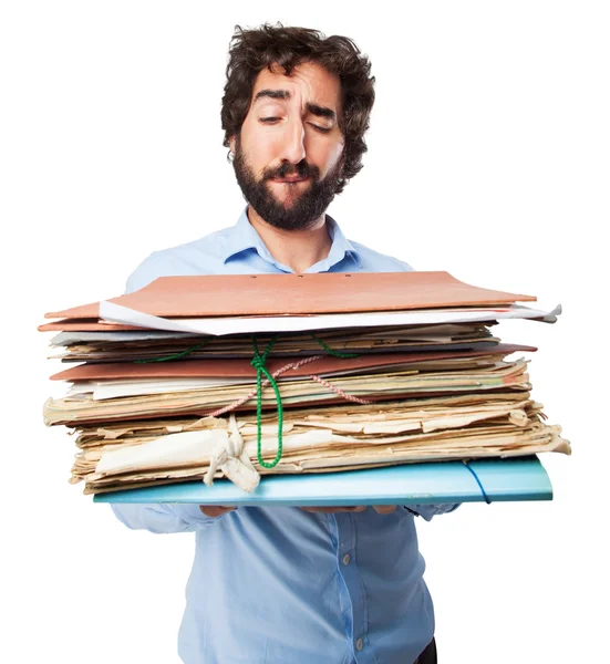 Joven aburrido con archivos — Foto de Stock