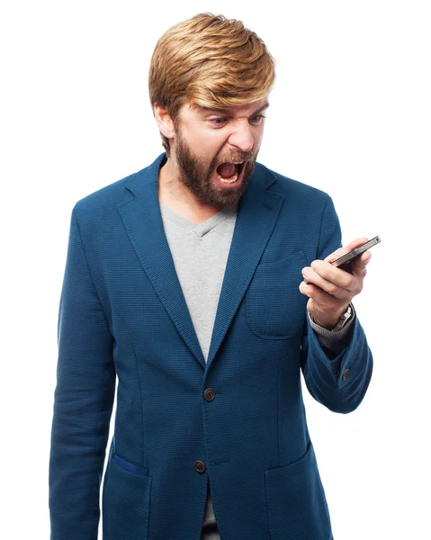 Angry businessman with telephone — Stock Photo, Image