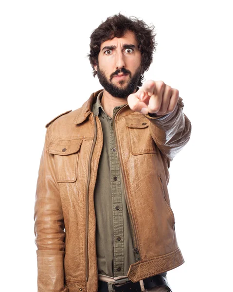 Worried young man pointing front — Stock Photo, Image