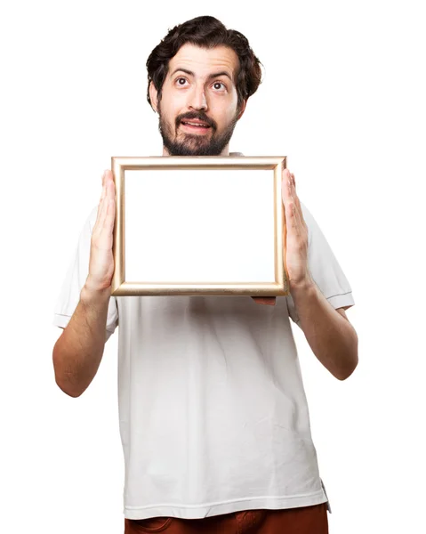 Gek jongeman met retro frame — Stockfoto