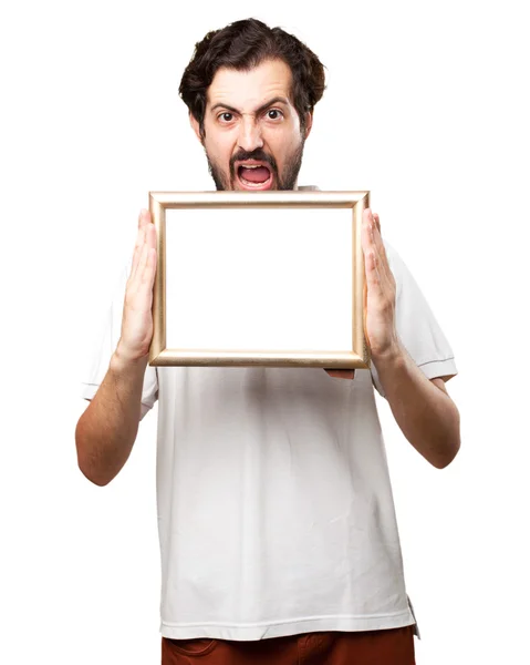 Crazy young man with retro frame — Stock Photo, Image