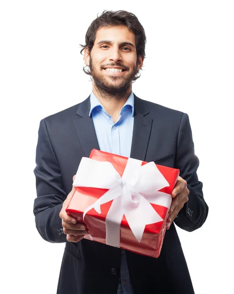 Homme d'affaires heureux avec cadeau — Photo