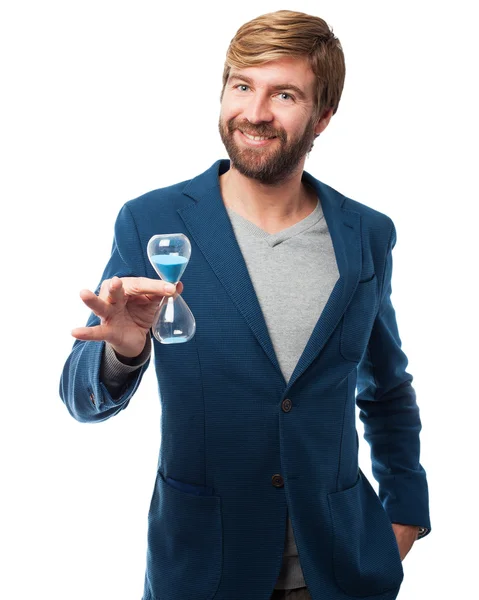 Happy businessman with sand timer — Stock Photo, Image