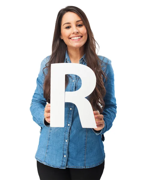 Happy young woman with letter r — Stock Photo, Image