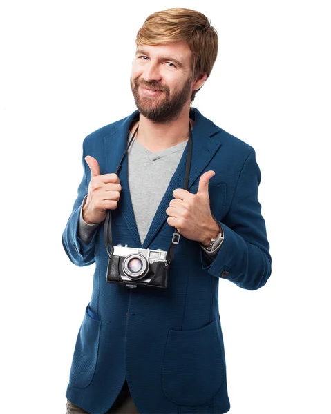 Гордый бизнесмен с камерой — стоковое фото