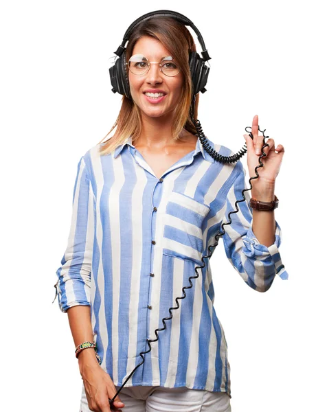 Young woman dancing with headphones — Stock Photo, Image