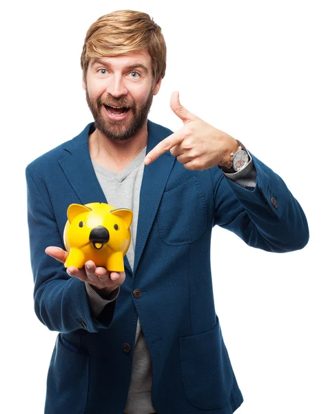 Homem de negócios feliz com banco porquinho — Fotografia de Stock