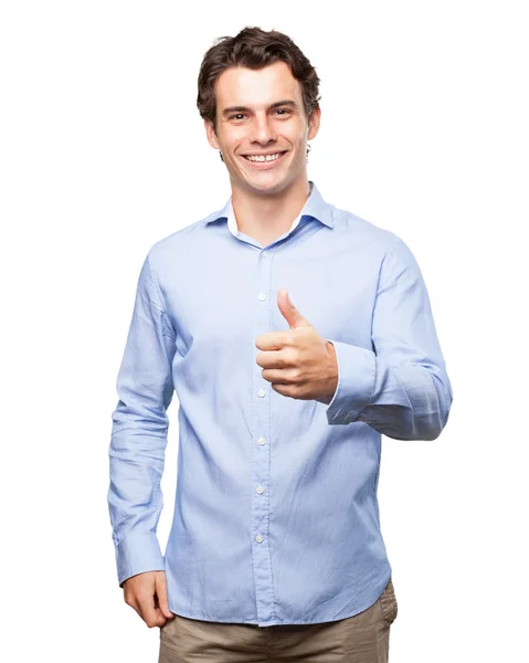 Šťastný mladý muž s dobrý znamení — Stock fotografie
