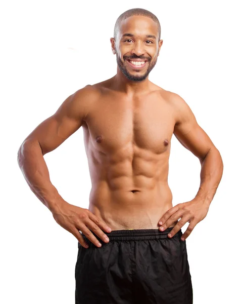 Feliz negro hombre fuerte pose — Foto de Stock