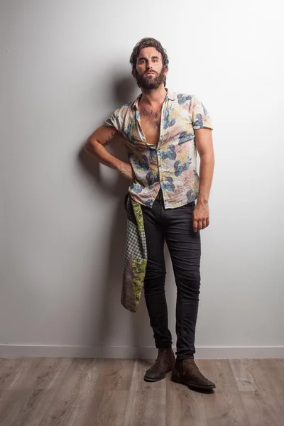 Rock musician posing in studio — Stock Photo, Image