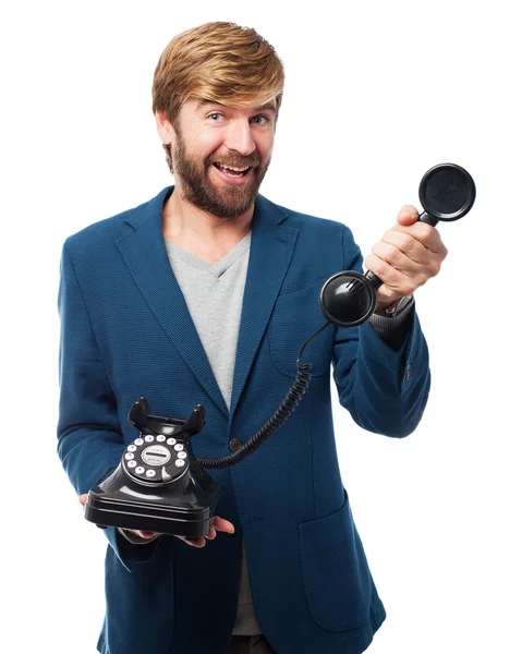 Happy businessman with telephone — Stock Photo, Image